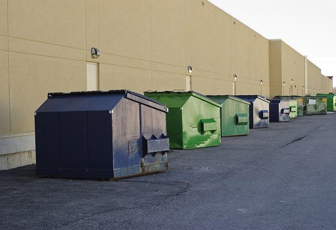 metallic dumpster units staged for construction garbage in Boca Raton